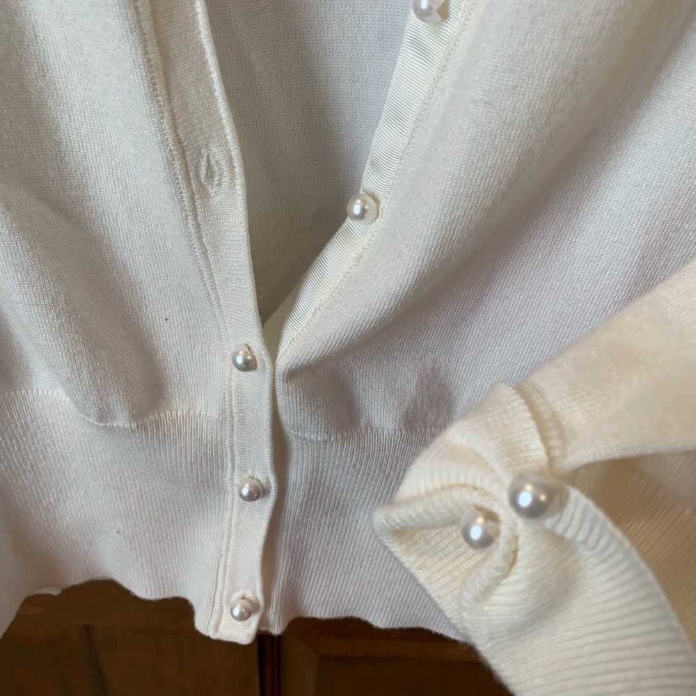 Cream/Ivory cardigan. Satin and pearls
